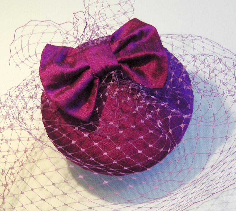 Magenta Silk Bow Veiled Cocktail Hat.